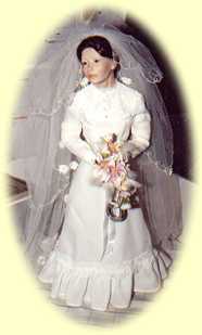 This doll is a copy of Jenny on her Wedding day.  We used her actual dress and veil to make the doll's outfit
